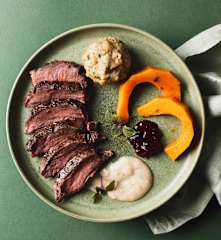 Saddle of Venison with Cranberry Compote, Mushroom Dumplings and Squash